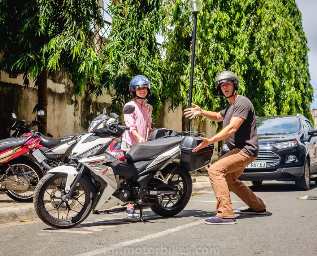 Excited Couple Renting Motorbike